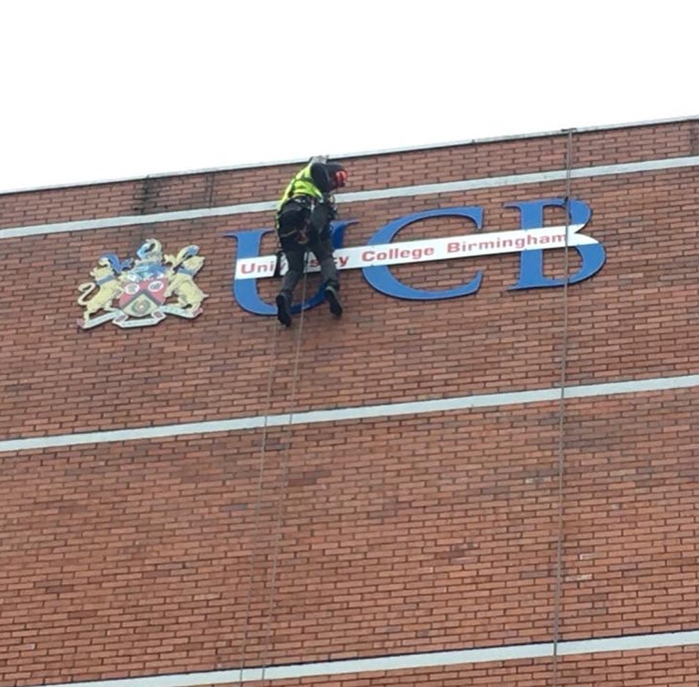 University signs Abseil signs